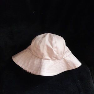 Burberry, tan hat.